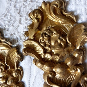 Antique gilded ormolu angel cherub putti hook covers wall hanging decor ornaments French architectural salvaged 1800s architecture panels