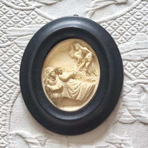 Antique French 1800s religious meerschaum frame w saint John Francis Regis in black wooden frame, hand sculptured devotional art gift