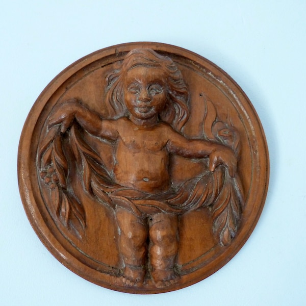 Ancien enfant en bois ou putti chérubin bas-relief, médaillon, tenture murale, décoration architecturale française sculptée, art de l'architecture récupéré