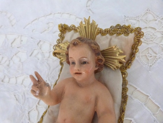 Antique religious statue child infant Jesus Christ w glass eyes, hand painted christmas nativity figure w halo satin cushion 4 church crèche