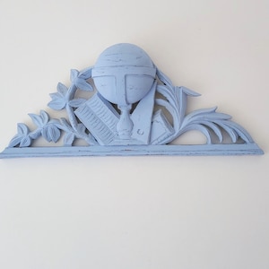 May include: A set of three ceramic mugs with a speckled, matte finish. The mugs are in shades of cream, light gray, and dark gray. Each mug has a simple, minimalist design and a rounded handle.