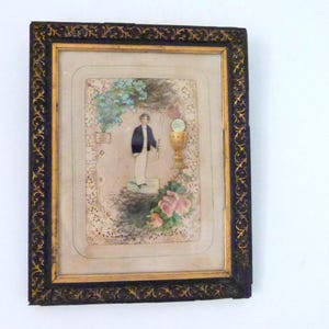 Religious French frame w paper lace, dried flowers in black wooden frame, first Holy communion of boy souvenir 1800s devotional wall art