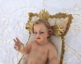 Antique religious statue child infant Jesus Christ w glass eyes, hand painted christmas nativity figure w halo satin cushion 4 church crèche