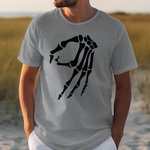 Gray t-shirt with a black skeleton hand making an "okay" gesture.