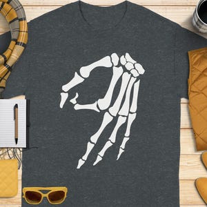 Dark gray t-shirt with white "okay" hand gesture graphic.