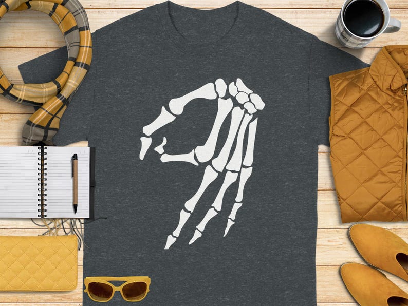 Dark gray t-shirt with white "okay" hand gesture graphic.