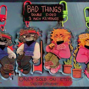 BAD THINGS Double-sided keyrings