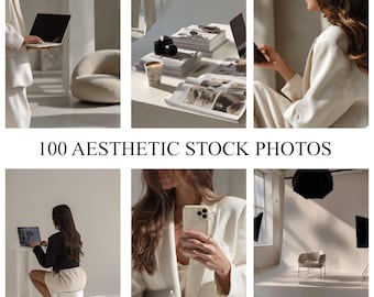 May include: A collection of aesthetic stock photos featuring neutral tones. The images showcase laptops, cameras, magazines, and a coffee cup. The text "100 AESTHETIC STOCK PHOTOS" is displayed in a bold, black font.