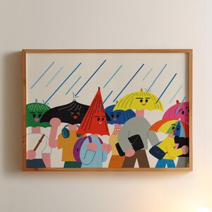 May include: A framed art print depicts a whimsical illustration of people walking in the rain. Each person is sheltered by a colorful umbrella, with rain falling from the top. The umbrellas are various colors, including red, yellow, and green.