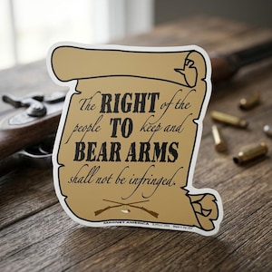 May include: A set of three ceramic mugs with a speckled, matte finish. Each mug features a different color: light blue, cream, and gray. The mugs have a simple, modern design with a rounded shape and a comfortable handle.