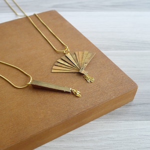 Vintage 1980s Gold Oriental Folding Fan Necklace, Phoenix & Crane Design, Tassel Pendant, Slim Bar Shape