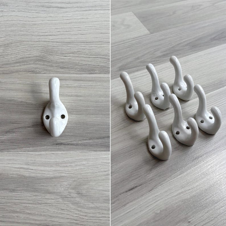 Vintage ceramic wall hooks in a rustic farmhouse style