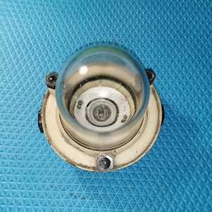 May include: A set of three ceramic mugs with a speckled, matte finish. The mugs are in shades of cream, light grey, and dark grey. Each mug has a simple, minimalist design, ideal for coffee or tea.