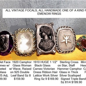 May include: Five vintage rings with different designs and gemstones. The rings feature a black jet face cameo, a camphor glass woman cameo, a black glass cameo Victorian, a sterling silver cross on a star, and a mirrored pink heart in brass with Czech green rhinestones.