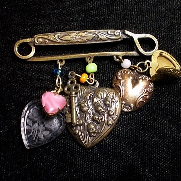 SALEGorgeous Family of Hearts Brass Pin, w/ Dangling Puffy Brass Hearts & Key, Tiny Locket, Clear Rose Etched Glass, Pink Moon Glow Brooch .