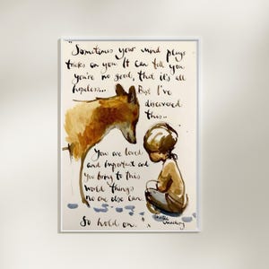 May include: Framed watercolour print with a fox and child illustration, accompanied by handwritten text. The text reads, "Sometimes your mind plays tricks on you... So hold on." The artwork is in a white frame.