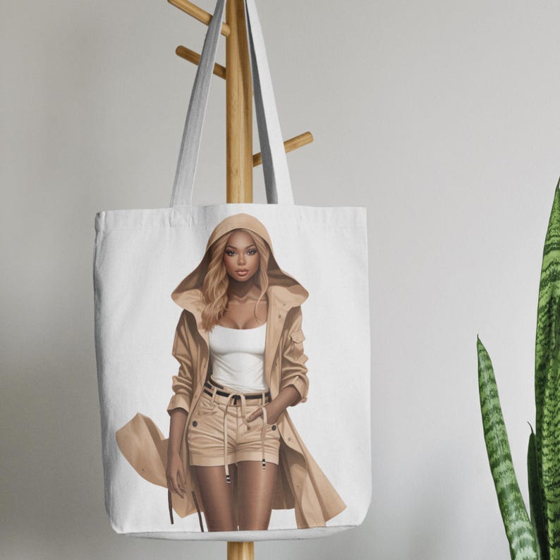 Fashionable black woman PNG illustration with luxury neutral tones, hooded trench coat styling, and a sophisticated modern girl vibe. This fashion clipart is perfect for boutique branding, lifestyle blog graphics, planner covers, and sublimation designs. The elegant neutral palette feels stylish and timeless.