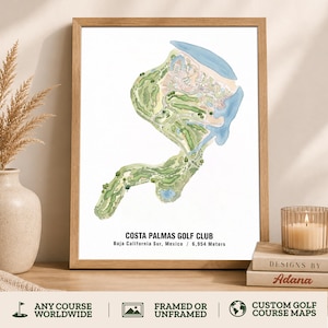 May include: A framed watercolor-style map of the Costa Palmas Golf Club in Baja California Sur, Mexico, labeled with the text 'COSTA PALMAS GOLF CLUB' and 'Baja California Sur, Mexico / 6,954 Meters', featuring green fairways and blue water.