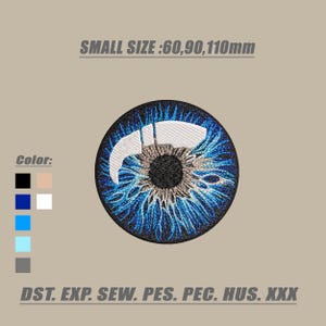 Op de afbeelding: Geborduurd ooglapje met blauwe, zwarte en witte details. De iris heeft ingewikkelde blauwe stiksels en de tekst "SMALL SIZE: 60,90,110mm" staat hierboven. De kleuropties worden links weergegeven.