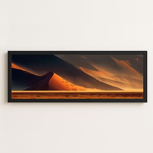 May include: A panoramic landscape print in a thin black frame featuring a desert scene with large, orange-hued sand dunes under dark, shadowed mountain peaks. The foreground shows a flat, golden-brown plain stretching across the horizon.