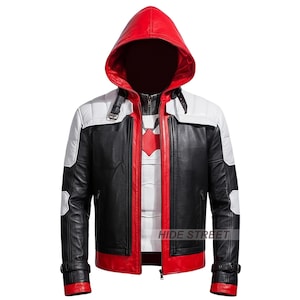 May include: A hooded leather jacket in black, white, and red. The jacket features a red hood, white shoulder panels, and a red emblem on the chest. The jacket has a zipper closure and adjustable cuffs.