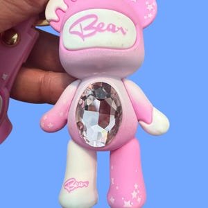 May include: A rustic wooden sign with the text "Welcome to our home" in white lettering. The sign features a distressed finish and a simple, inviting design, perfect for entryway decor.