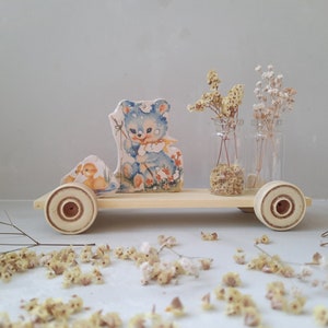 Cute Nostalgic blue bearish ceramic figure on wooden wheels One Of A Kind