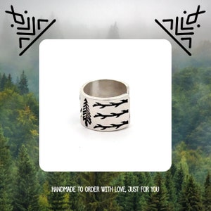 May include: Silver ring with a black tree and branches design. Handmade to order with love, just for you.