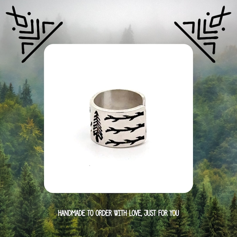 May include: Silver ring with a black tree and branches design. Handmade to order with love, just for you.