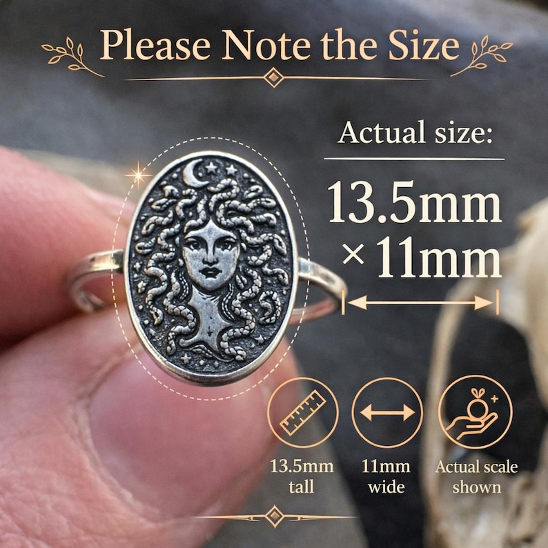 May include: A silver-toned ring featuring an oval face with a relief of a face surrounded by snakes, stars, and a crescent moon. Text on the image reads: Please Note the Size, Actual size: 13.5mm x 11mm, 13.5mm tall, 11mm wide, Actual scale shown.