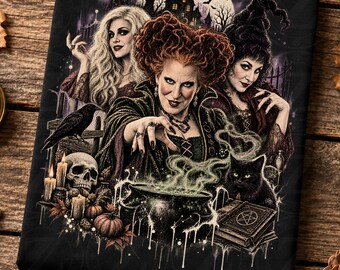 May include: A rectangular canvas print featuring three women with distinct hairstyles, including one with voluminous red hair, standing behind a bubbling cauldron. The scene includes a black cat, a skull, a raven, pumpkins, and a book with a pentagram.