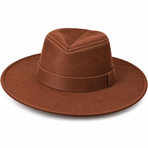 May include: A solid brown fedora hat with a wide brim and a matching brown hat band. The crown features a distinct pinched top design with visible light brown stitching along the crease, providing a structured look to the smooth, matte finish.
