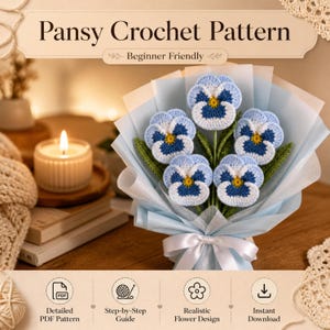 May include: A bouquet of crocheted pansies in shades of blue, white, and yellow, wrapped in light blue paper and tied with a white ribbon. The text "Pansy Crochet Pattern" and "Beginner Friendly" are displayed at the top. The image also includes icons for a detailed PDF pattern, step-by-step guide, realistic flower design, and instant download.