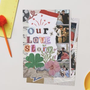 May include: A scrapbook page with the words "Our Love Story" in colorful letters, decorated with photos, flowers, and other embellishments. A yellow notepad and orange pen with a pom-pom top are on the left.