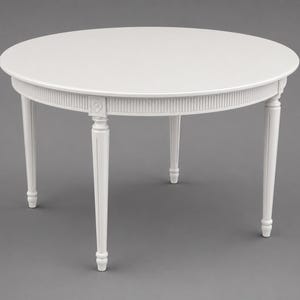 May include: A round white table featuring a smooth circular top and four tapered legs. The apron of the table is decorated with vertical fluting and a small square block at the top of each leg, which is accented with a carved flower detail.