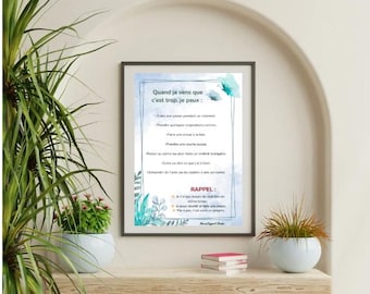 May include: A framed print with a light blue watercolor background and text in French. The text includes phrases like "Quand je sens que c'est trop, je peux" and "Rappel". The frame is black, and the print is displayed on a wooden shelf with plants.