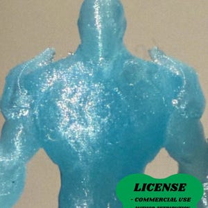 May include: A light blue figurine of a muscular figure, viewed from the back. The figure has broad shoulders and a smooth, textured surface. A green oval with the word "LICENSE" and other text is in the lower right corner.