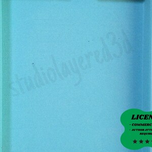 May include: A light blue rectangular object with a textured surface. The text "studiolayered3d" is faintly visible. A green sticker in the lower right corner states "LICENSE - COMMERCIAL USE - AUTHOR ATTRIBUTION REQUIRED" with five stars.