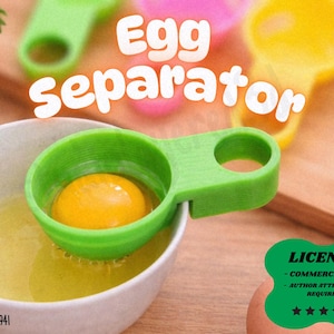 May include: A green egg separator with a handle, holding an egg yolk over a bowl of egg whites. The word "Egg separator" is written in white. Other colorful separators are in the background.