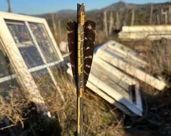 Washed black and yellow desk display arrow