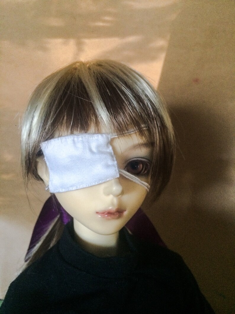 doll with eye patch