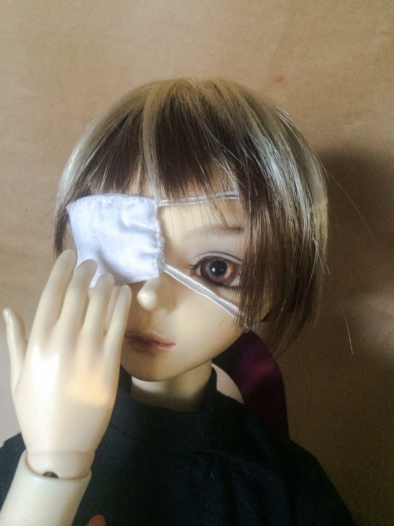 doll with eye patch