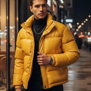 May include: A bright yellow puffer jacket with a high collar and snap closures. The jacket is worn over a black turtleneck and paired with black pants. A silver watch and chain are visible.