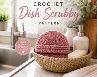 May include: A round, dusty rose crochet dish scrubby with a textured surface, resting in a woven basket. The image includes text reading CROCHET Dish Scrubby PATTERN, QUICK EASY & BEGINNER FRIENDLY, COTTON YARN, 3.5-4.0 MM HOOK, and HANDMADE WITH LOVE.