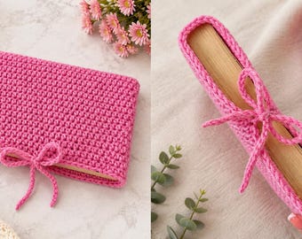 May include: A handmade, hot pink crochet book cover with a matching bow closure. The cover is shown with a book inside, and a separate image shows a book wrapped in a similar crochet sleeve. A ball of pink yarn is also visible.