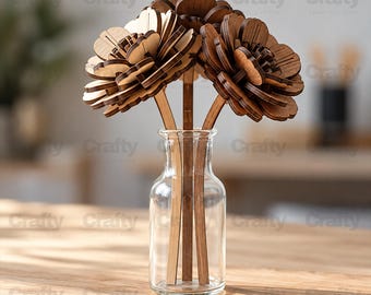 May include: A clear glass bottle containing three laser-cut wooden flowers with layered petals in varying shades of brown. Each flower is attached to a thin, flat wooden stem, creating a structured, multi-dimensional floral arrangement.