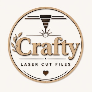 May include: A circular wooden sign featuring the word Crafty in large, light-colored letters. Above the text is a dark laser head icon with rays, and below is the text LASER CUT FILES with a small heart icon. The design has a light wood border.