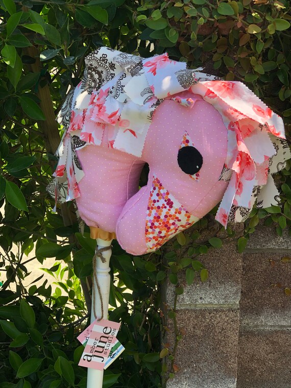 pink stick horse