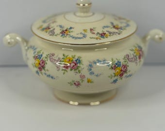 Vintage Homer Laughlin Eggshell Nautilus creamer in a delicate floral pattern with gold trim. Made in the USA, this mid-century piece featur