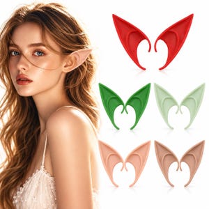 Peut inclure: Un ensemble de cinq paires d'accessoires d'oreilles pointues en rouge, vert foncé, vert clair, pêche clair et beige. Chaque paire présente un design incurvé conçu pour s'adapter sur l'oreille externe, illustré avec une paire portée sur une oreille.
